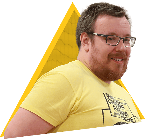 Volunteer smiling in Para Sport Festival kit from the 2022 insport Series: Para Sport Festival.